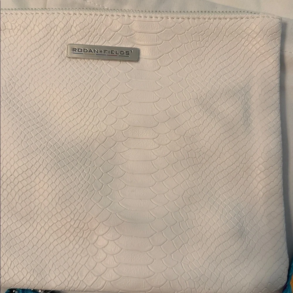 Rodan + Fields Clutch Set